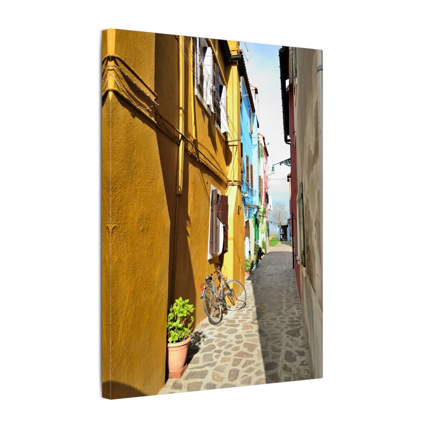 Mulano Street Scene Matte Canvas Print — Yellow Houses & Hanging Clothes, Stretched Wall Art