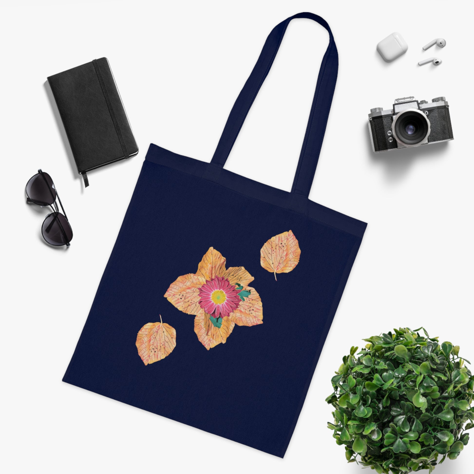 fallen-leaves-autumn-design-with-red-flower - front view