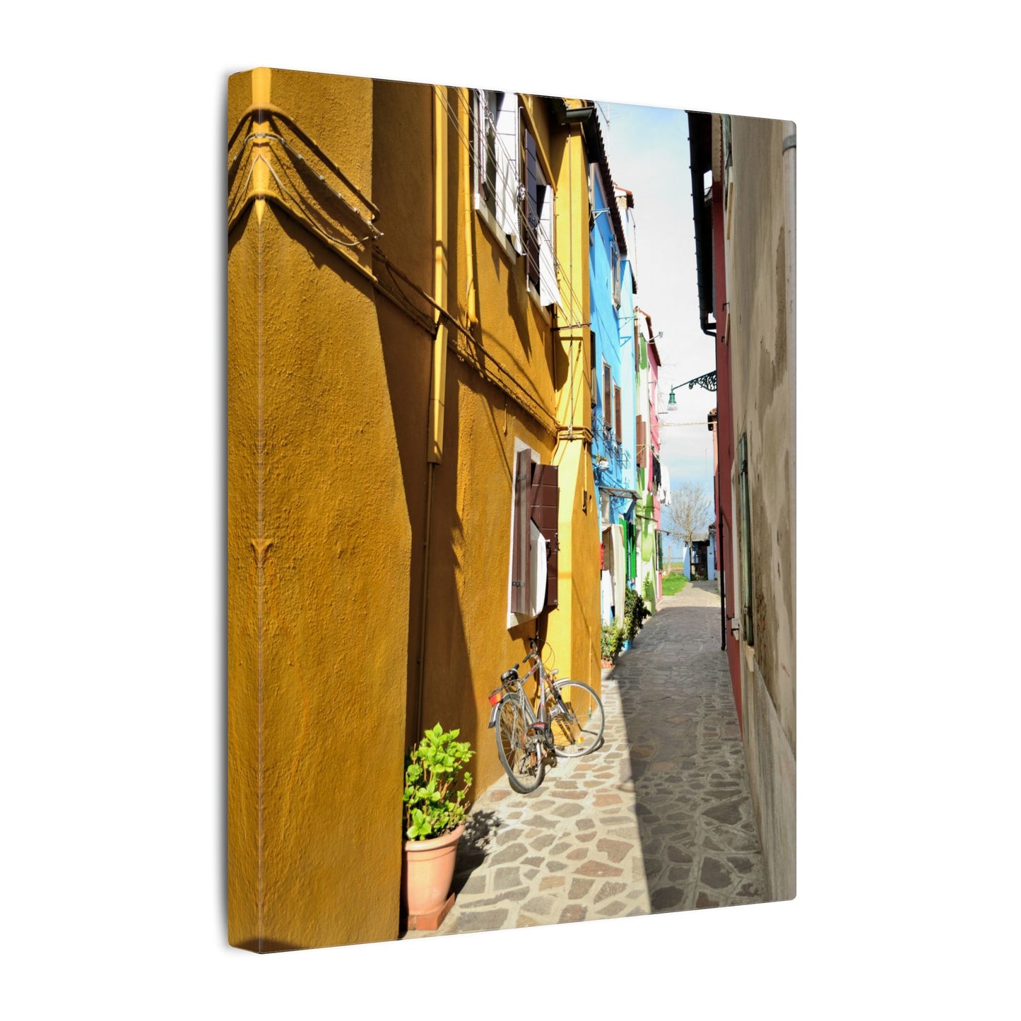 Mulano Street Scene Matte Canvas Print — Yellow Houses & Hanging Clothes, Stretched Wall Art