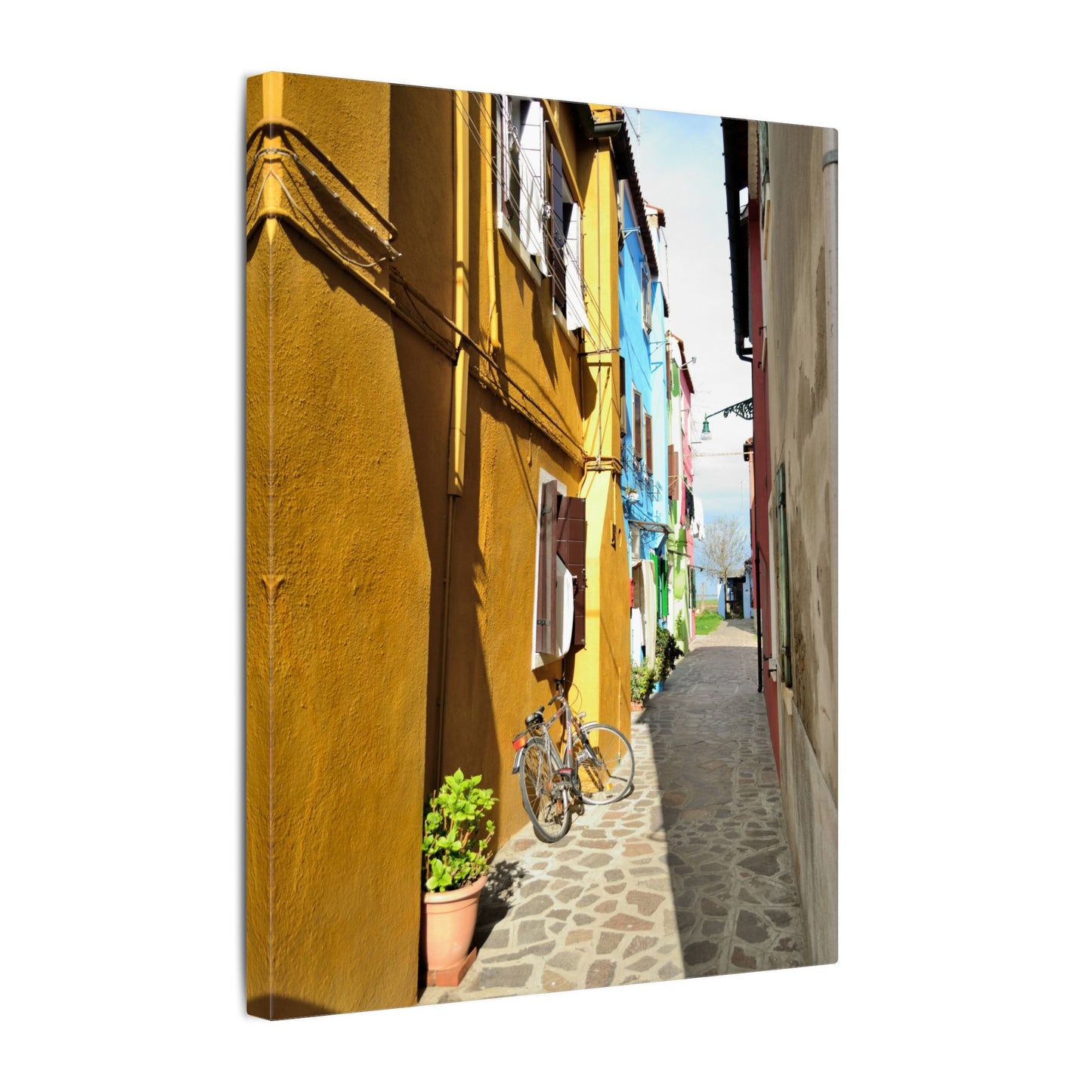 Mulano Street Scene Matte Canvas Print — Yellow Houses & Hanging Clothes, Stretched Wall Art