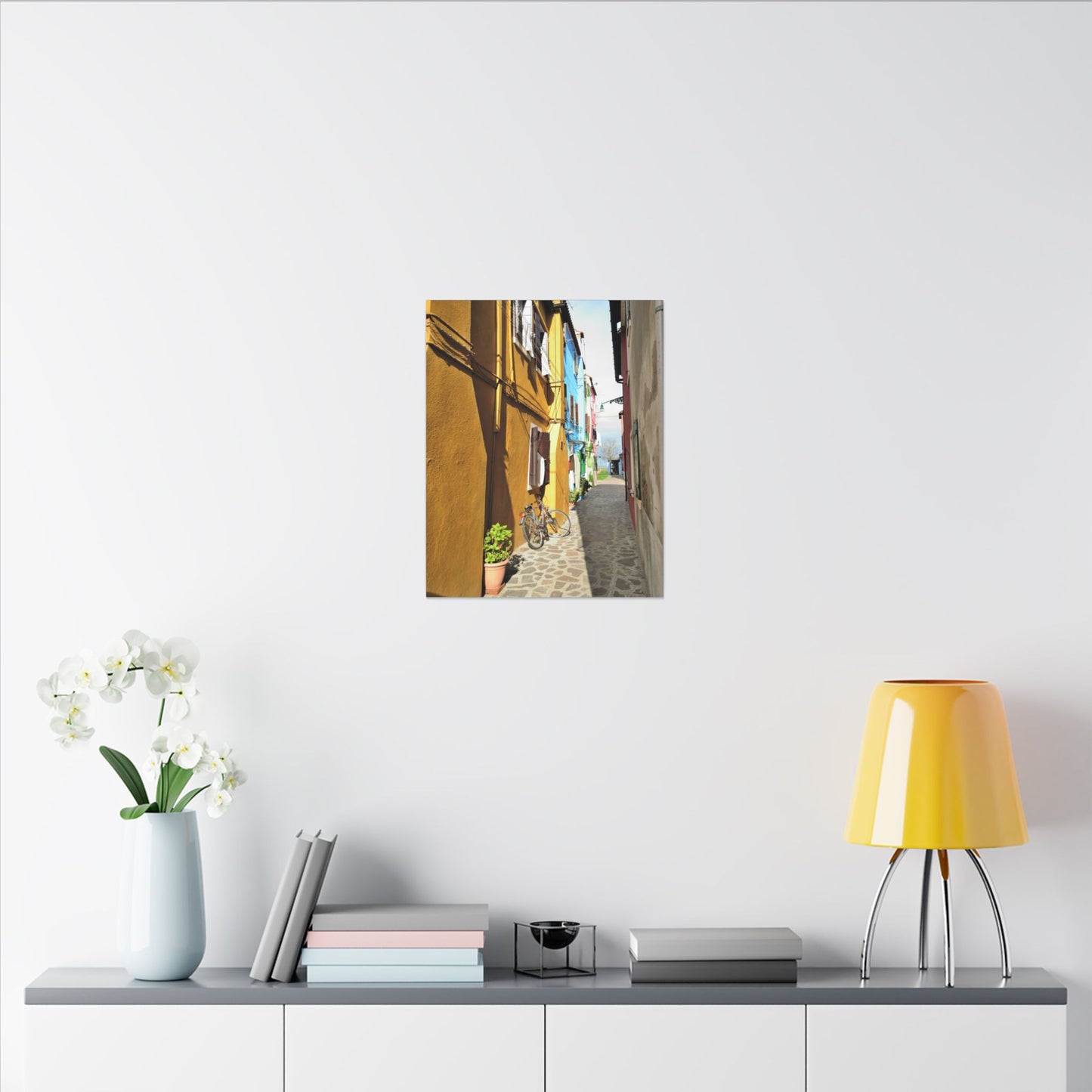 Mulano Street Scene Matte Canvas Print — Yellow Houses & Hanging Clothes, Stretched Wall Art