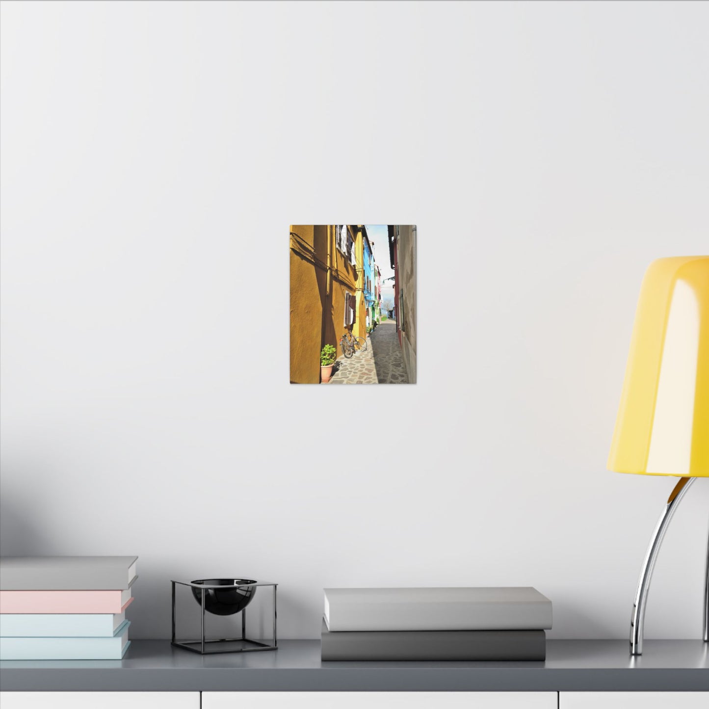 Mulano Street Scene Matte Canvas Print — Yellow Houses & Hanging Clothes, Stretched Wall Art