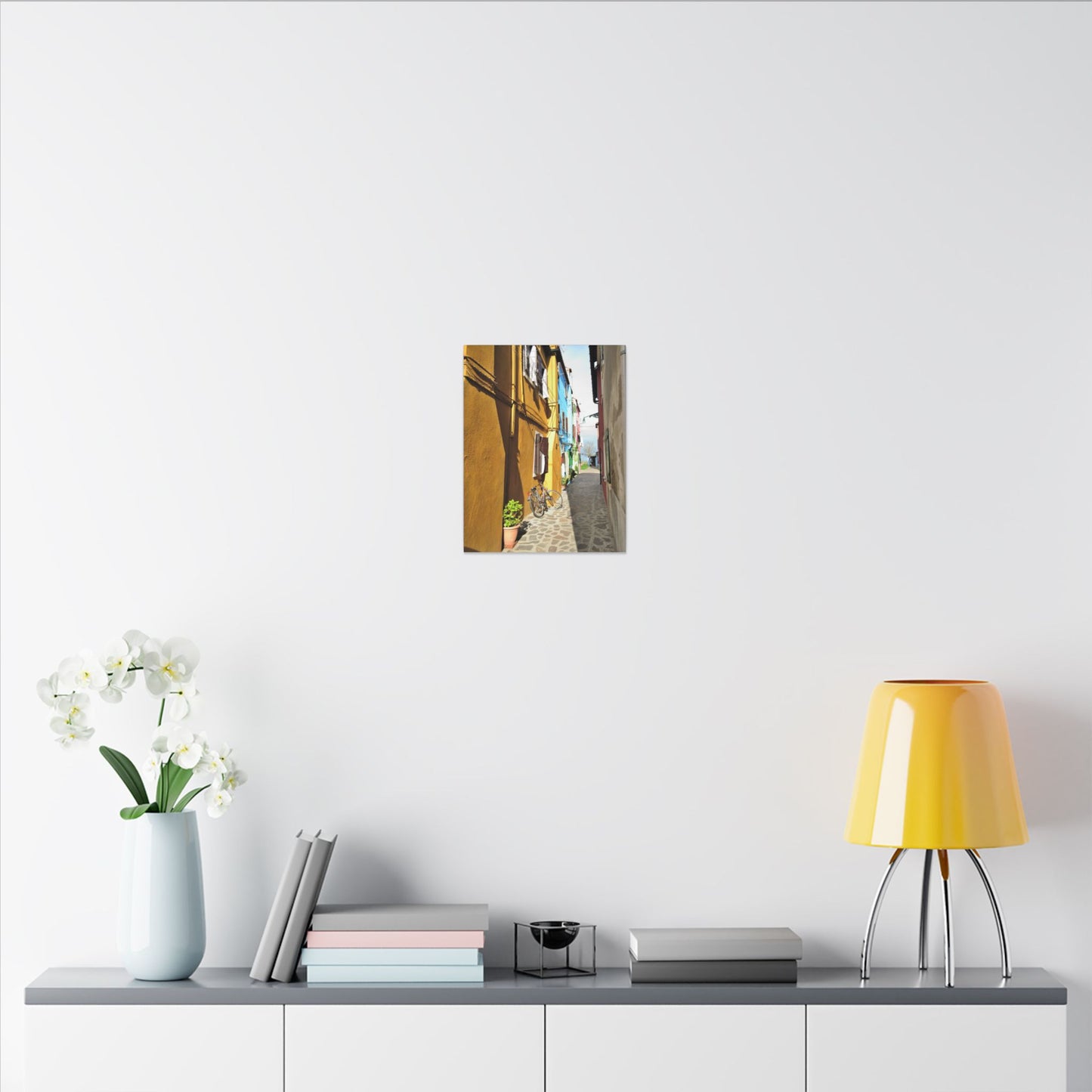 Mulano Street Scene Matte Canvas Print — Yellow Houses & Hanging Clothes, Stretched Wall Art