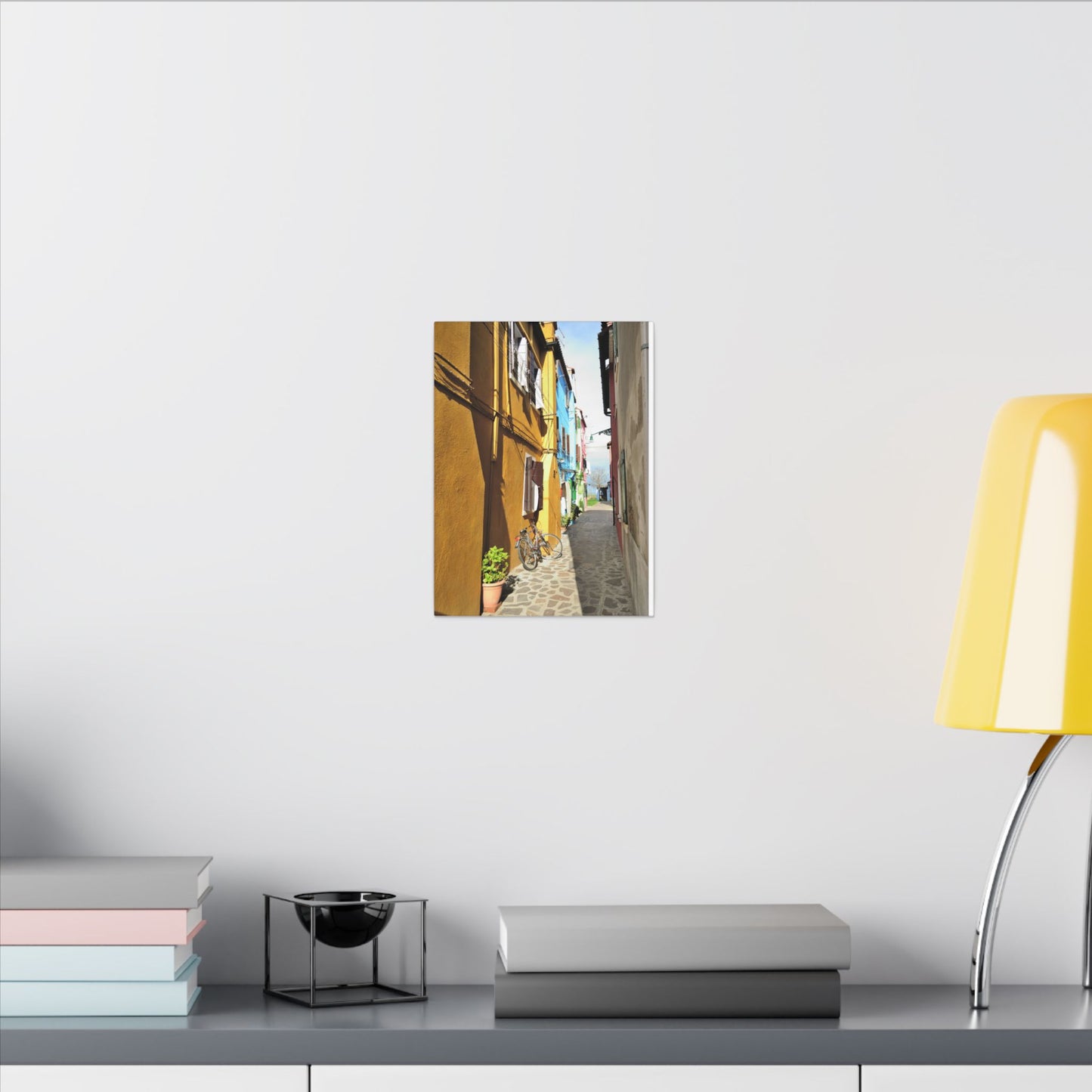 Mulano Street Scene Matte Canvas Print — Yellow Houses & Hanging Clothes, Stretched Wall Art